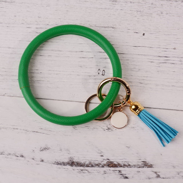 Rainbery New Fashion Multiful Tassel Keychain Enamel PU Leather O Key Chain Monogram Circle Wristlet Keychain For Women Girls