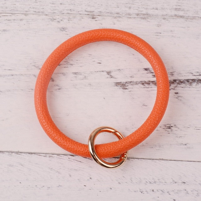 Rainbery New Fashion Multiful Tassel Keychain Enamel PU Leather O Key Chain Monogram Circle Wristlet Keychain For Women Girls